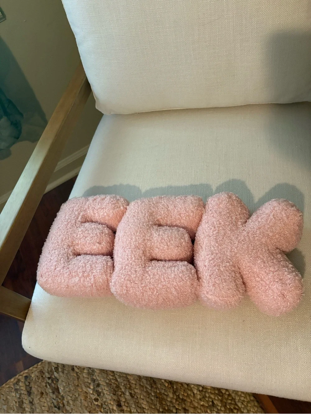 Plush 'E E K' pillow